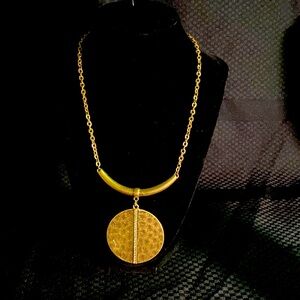 18” gold plated necklace with 3.5” extender w/cubic zirconia in center.